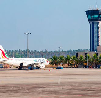 Close up view of an Aero plane landed on the ground at sunset